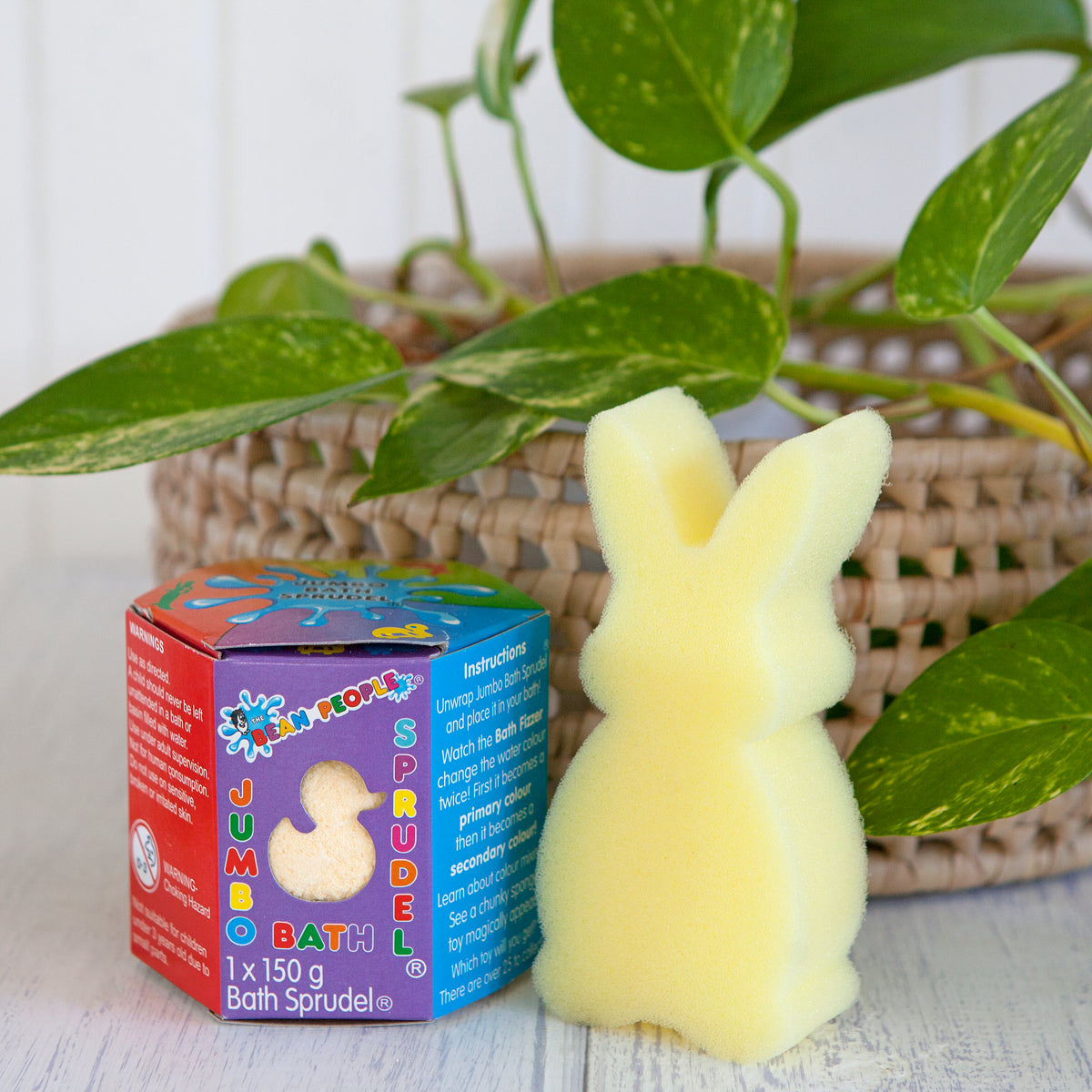 Jumbo Bath Bomb Sprudel in its box with a bunny sponge toy