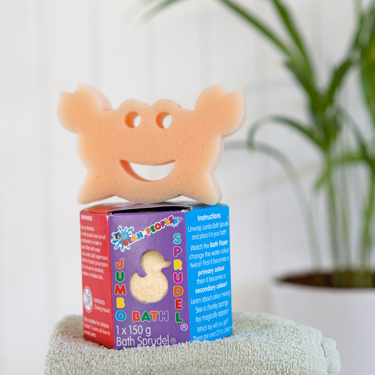 Jumbo Bath Bomb Sprudel in its box with a crab sponge toy