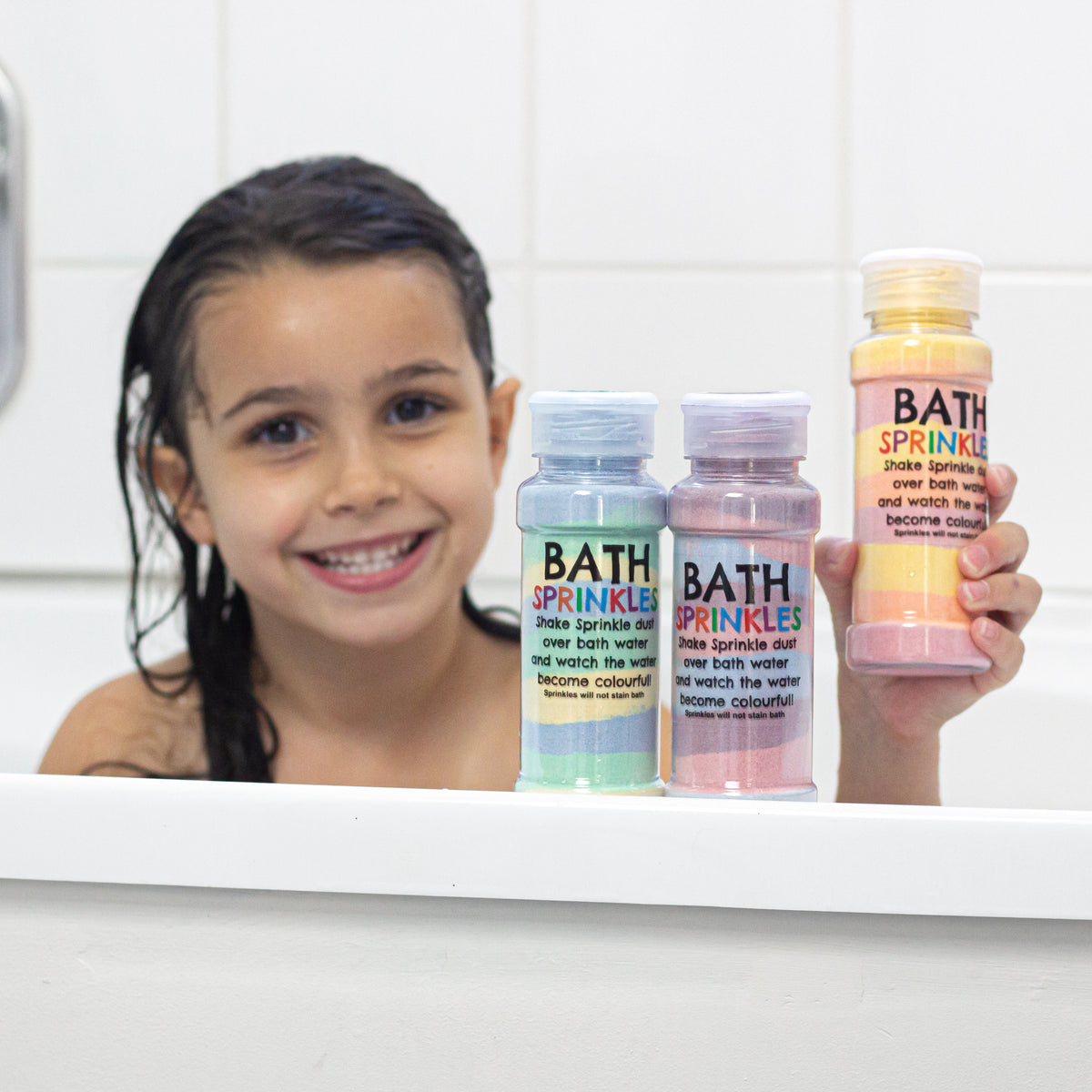 Girl in the bath with Bath Sprinkles