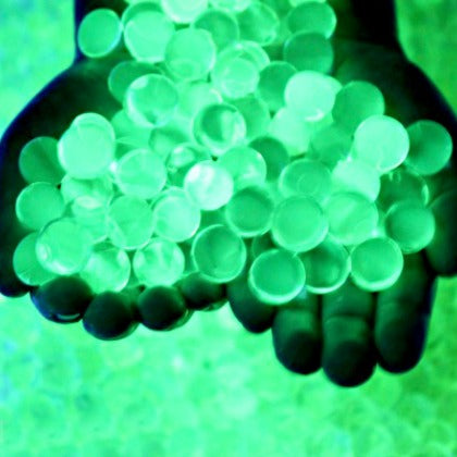 Glow in the dark water beads glowing